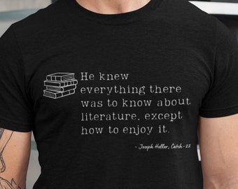 May include: A black t-shirt with a white graphic print of a stack of books and a quote from Joseph Heller's Catch-22: "He knew everything there was to know about literature, except how to enjoy it."