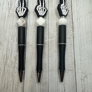 Skeleton hand beaded pen