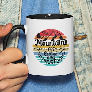 The Mountains Are Calling and I Must Go Ceramic Mug, 11 oz Mountain Inspired Coffee/ Tea Cup, Nature & Adventure Lover Mug, Gift for Her/Him