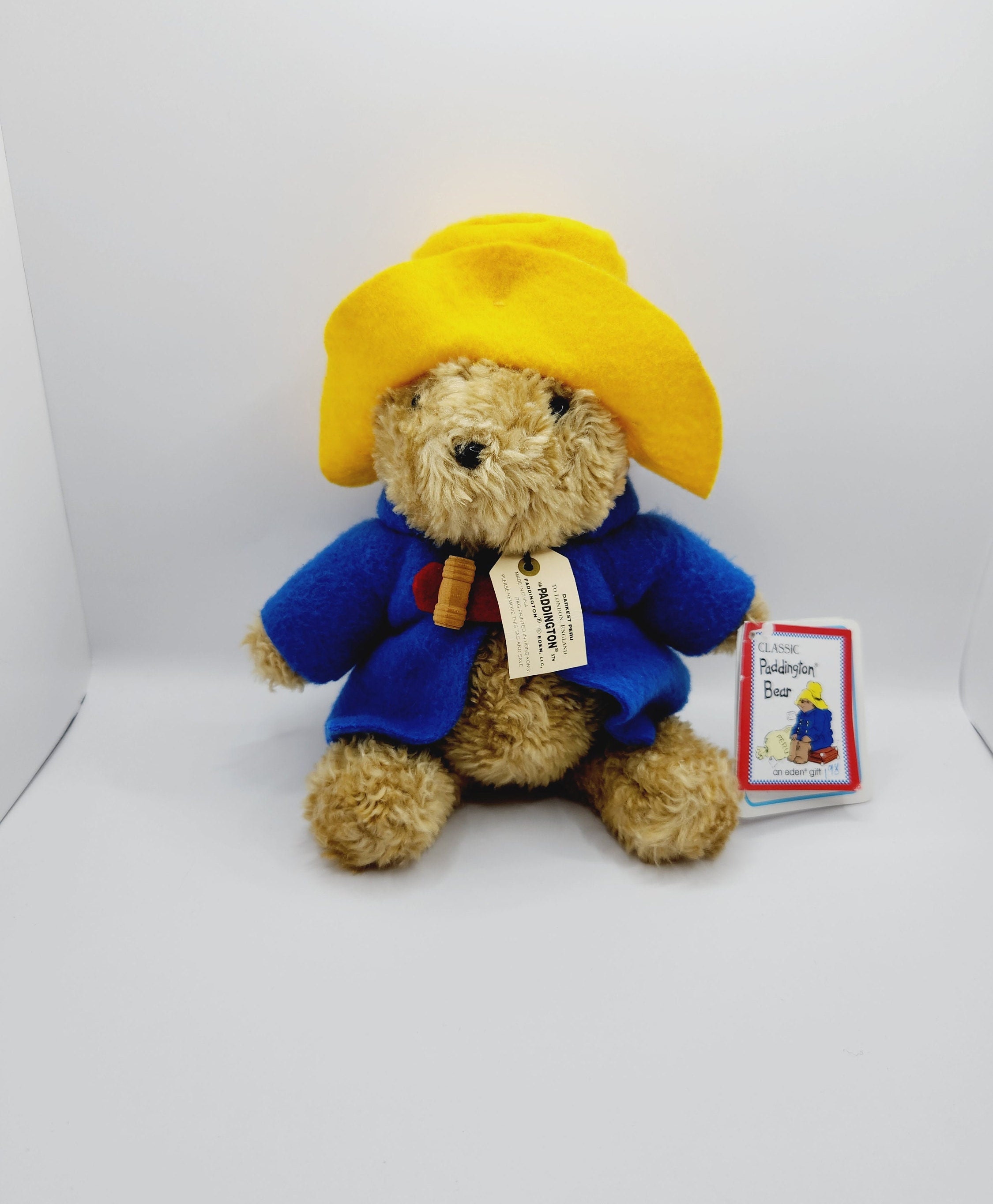 Paddington en imperméable jaune et chapeau, veste vintage