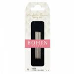 May include: Package of Bohin needles. The needles are silver and are displayed on a black background. The package has a pink banner with the word "BOHIN" in white. The package is white with a decorative pattern.