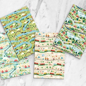 K&ouml;nnte beinhalten: Vier verschiedene Musterbl&auml;tter f&uuml;r Geschenkpapier mit einem Zug- und Landschaftsdesign. Die Muster umfassen einen gr&uuml;nen Hintergrund mit blauen Fl&uuml;ssen, einen cremefarbenen Hintergrund mit roten Z&uuml;gen, einen hellblauen Hintergrund mit roten Z&uuml;gen und einen gr&uuml;nen Hintergrund mit roten Z&uuml;gen.