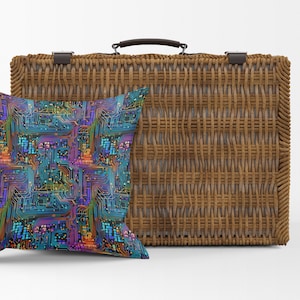 May include: A woven wicker suitcase with a brown leather handle and a blue, green, and purple pillow with a circuit board pattern.