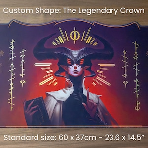 May include: Custom-shaped playmat featuring a fantasy illustration of a horned figure with a book, set against a red and purple background. The mat has a standard size of 23.6 x 14.5 inches and includes the text "Custom Shape: The Legendary Crown".