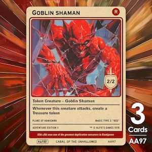 Op de afbeelding: Een ruilkaart met een rode Goblin Shaman-illustratie en een beoordeling van 2/2. De tekst op de kaart beschrijft de vaardigheden van het wezen en komt uit de Adventure Edition II. De afbeelding toont in totaal drie kaarten.