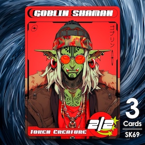 Op de afbeelding: Een rode en zwarte kaart met de tekst "Goblin Shaman" en "Token Creature" erop. De kaart toont een illustratie van een groene goblin die een rood-zwarte muts, zonnebril en een ketting draagt. De kaart heeft ook het nummer "3" en de tekst "Cards" en "SK69" erop.