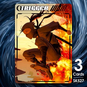 May include: A trading card featuring a ninja in a dynamic pose, set against a fiery background. The card has the word "TRIGGER" at the top and the number "3" with the text "Cards" and "SK527" at the bottom.