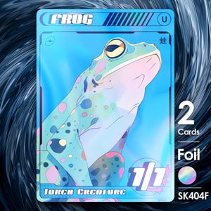 May include: A trading card featuring a stylized illustration of a frog. The card has a blue background with the word "FROG" at the top. The card also includes the text "TOKEN CREATURE" and "1/1". The card is labeled "Foil" and "2 Cards".