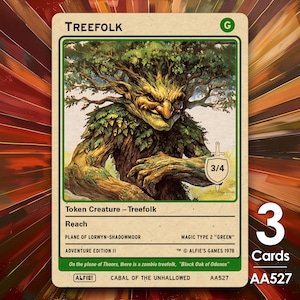 May include: A Treefolk card from Adventure Edition II, featuring a detailed illustration of a tree-like creature with the text "TREEFOLK" at the top. The card includes the text "Token Creature - Treefolk", "Reach", and "3/4". The card is green and white with the number "3" and the word "Cards" on the right.