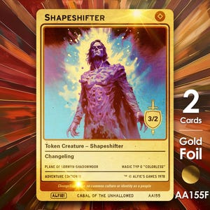 Pode incluir: Carta colecionável dourada com um "Shapeshifter" roxo. Apresenta "Changeling", "Adventure Edition II" e "2 Cartas". A carta tem uma classificação de 3/2 e é da Alfie's Games.