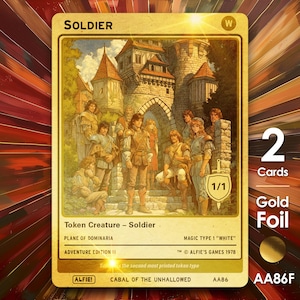 May include: Gold foil trading card featuring a group of soldiers in front of a castle. The card reads "SOLDIER" at the top and includes the text "Token Creature - Soldier" and "PLANE OF DOMINARIA". The card is marked "1/1" and "AA86F".