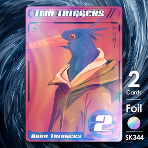 May include: A pink and blue card with a bird illustration. The card has the text "TWO TRIGGERS" and "MADU TRIGGERS" on it. The card is labeled "2 Cards Foil" and has a holographic sticker with the number "2" on it. The card also has the text "SK344" on it.