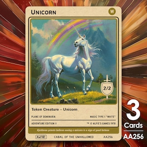 May include: A white unicorn card with a rainbow in the background. The card is from the game "Alfie's Games" and is a "Token Creature - Unicorn". The card is from the "Plane of Dominaria" and is part of the "Adventure Edition II". The card has a power of 2 and a toughness of 2. The card is a "Magic Type 1 "White"". The card is from the "Cabal of the Unhallowed" and has the code "AA256".