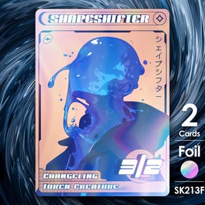 May include: A trading card featuring a blue, fluid-like figure with the text "SHAPESHIFTER" at the top. The card also includes Japanese text, the number "2", and the words "Cards" and "Foil". The card is labeled "CHANGELING TOKEN CREATURE".