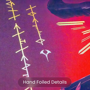 May include: Close-up of a purple and red artwork with gold and white foil details. The image features stylized symbols and the text "Hand Foiled Details" in a red oval.