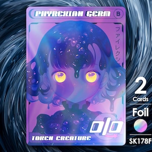 May include: A holographic trading card featuring a purple and blue illustration of a creature with yellow eyes. The card is titled "Phyrexian Germ" and has a black "B" symbol in the top right corner. The card is labeled "Token Creature" and has a holographic foil finish.