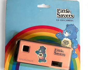 Cámara vintage de los Ositos Cariñositos, cámara de película Little Savers 110, cámara de juguete de los Ositos Cariñositos de los años 90, nueva de stock antiguo (NOS), artículo de colección retro.