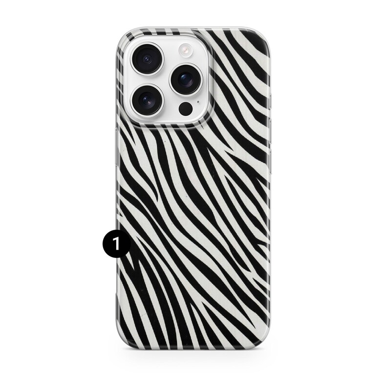 May include: A clear phone case with a black and white zebra stripe pattern. The case has a camera cutout and is designed to fit a smartphone. The case is made of a durable material and provides protection for the phone.