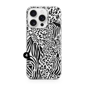 May include: A clear phone case with a black and white animal print design. The pattern combines zebra stripes and leopard spots. The case has a camera cutout and a black number 4.