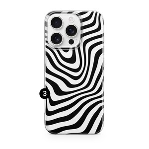 May include: A clear phone case with a black and white wavy pattern. The case has a glossy finish and a black number 3 in the lower left corner. The phone case is designed to fit a smartphone.