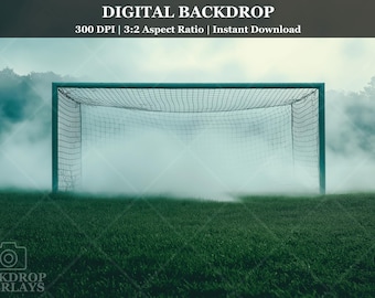 May include: A green soccer goal net on a grassy field with fog or smoke in the background.