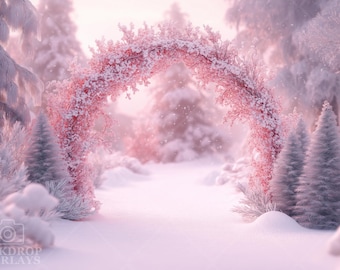 May include: A pink floral archway covered in snow stands in a snowy forest. The archway is surrounded by tall, snow-covered trees. The scene is bathed in a soft, pink light.