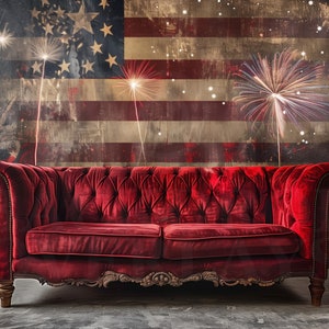 May include: A red velvet sofa sits in front of a distressed American flag backdrop with fireworks exploding in the background.