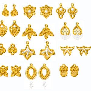 Puede incluir: Un conjunto de 20 abalorios de pendientes de color dorado con varios dise&ntilde;os, incluyendo formas florales, geom&eacute;tricas y abstractas. Algunos abalorios presentan cuentas blancas.