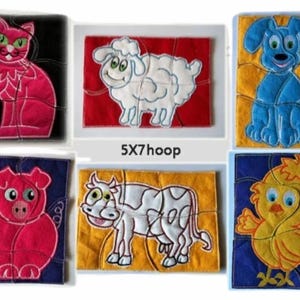 May include: A collection of six fabric puzzles featuring animal designs. The puzzles include a pink cat, a white sheep, a blue dog, a pink pig, a black and white cow, and a yellow chick. Each puzzle is made of several pieces.