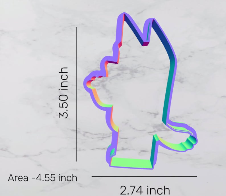 May include: A colorful cookie cutter shaped like a cartoon character. The cutter is 3.50 inches tall and 2.74 inches wide. The area of the cutter is 4.55 square inches.
