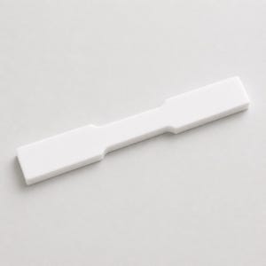 Könnte beinhalten: Ein weißes, rechteckiges Objekt mit einer schmalen Mitte und breiteren Enden. Das Objekt hat eine glatte, matte Oberfläche und scheint aus einem festen Material zu bestehen. Das Design ist schlicht und minimalistisch, mit klaren Linien und einer einheitlichen Farbe.