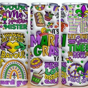 May include: A white tumbler with a Mardi Gras theme. The design includes text like "Pour me something mister" and "Let the good times roll." Graphics include a rainbow, mask, and fleur-de-lis. The tumbler is approximately 8 inches tall.