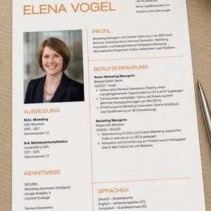 May include: A CV with the name ELENA VOGEL at the top. The CV includes a professional photo, education, skills, and work experience. The CV is printed on white paper with black text and orange headings.