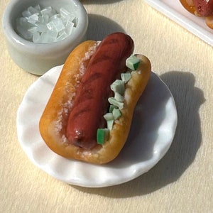 Miniature hotdog made to order. 12th scale realistic bbq’d hotdogs with choice of toppings