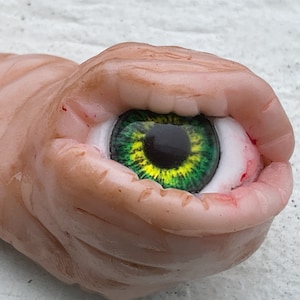 Gross one eyed / sharp teeth maggot slugs for display / creepiness / strange / weird sculpture