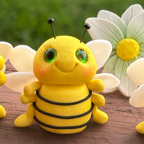 Little bumble bees cute handmade little guys made with polymer clay. Made to order