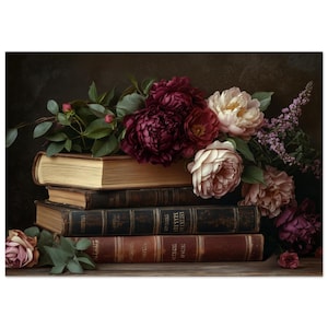 May include: A still life featuring a stack of antique books with gold-edged pages, topped with a lush arrangement of burgundy and blush peonies, roses, and sprigs of purple flowers. The books have aged leather covers.
