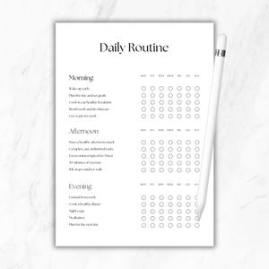 May include: A white daily routine planner sheet with black text and a white stylus. The document features sections for Morning, Afternoon, and Evening, each with a list of tasks and a grid of circular checkboxes for every day of the week.