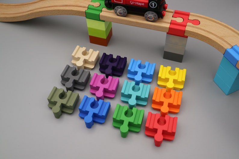 Duplo-Adapter für Holzeisenbahn-Schienen, geeignet für Brücken, in bunten Farben
