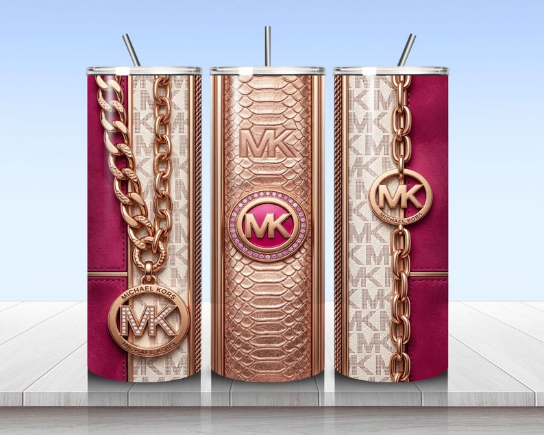 May include: Three cylindrical tumblers with straws featuring a rose gold snakeskin texture, a repeating MK logo pattern, and deep magenta panels. The design includes rose gold chain graphics and circular Michael Kors logo medallions with crystals.