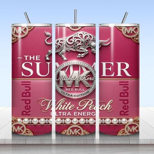 May include: A cylindrical tumbler with a pink and white design featuring a silver bull graphic, the text THE SUMMER, Michael Kors, Red Bull, White Peach, and ULTRA ENERGY. The design includes gold-toned corner accents and a row of white pearls.
