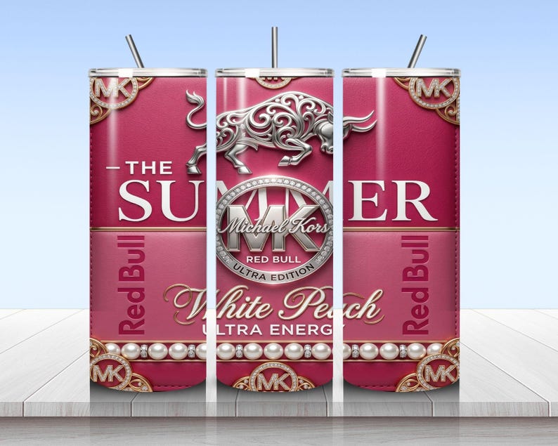 May include: A cylindrical tumbler with a pink and white design featuring a silver bull graphic, the text THE SUMMER, Michael Kors, Red Bull, White Peach, and ULTRA ENERGY. The design includes gold-toned corner accents and a row of white pearls.