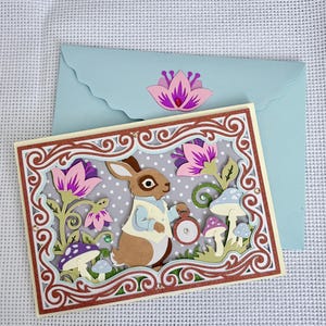 Puede incluir: Un letrero de madera rústica con el texto "Welcome to our home" en letras blancas. El letrero presenta un acabado envejecido y un diseño simple y acogedor, perfecto para un porche o entrada.