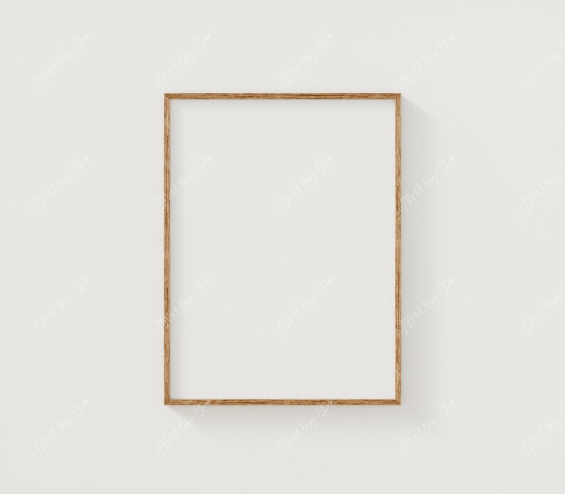 May include: A simple, wooden picture frame with a light brown finish. The frame is empty and ready to display a photo or artwork.