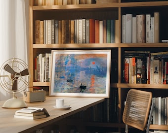 May include: A framed painting of a seascape with a red sun setting over a city skyline. The painting is hanging on a wooden bookshelf with books on either side.