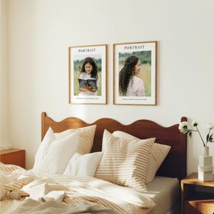 May include: Two framed photographs of portraits, each with the word "PORTRAIT" at the top. The photo on the left shows a young person sitting on a chair reading a book. The photo on the right shows a person with long hair standing in front of a green background. Both photos are displayed on a white wall above a wooden headboard with a striped pillow.