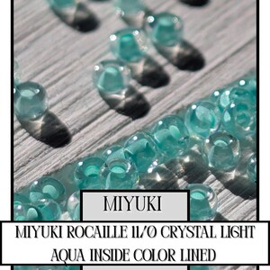 11-0218 Miyuki Rocailles 11/0 | Crystal/Light Aqua Inside Color Lined 20g