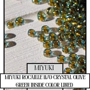 11-0229 Miyuki Rocailles 11/0 | Kristal/olijfgroen binnenzijde gekleurd 20 g