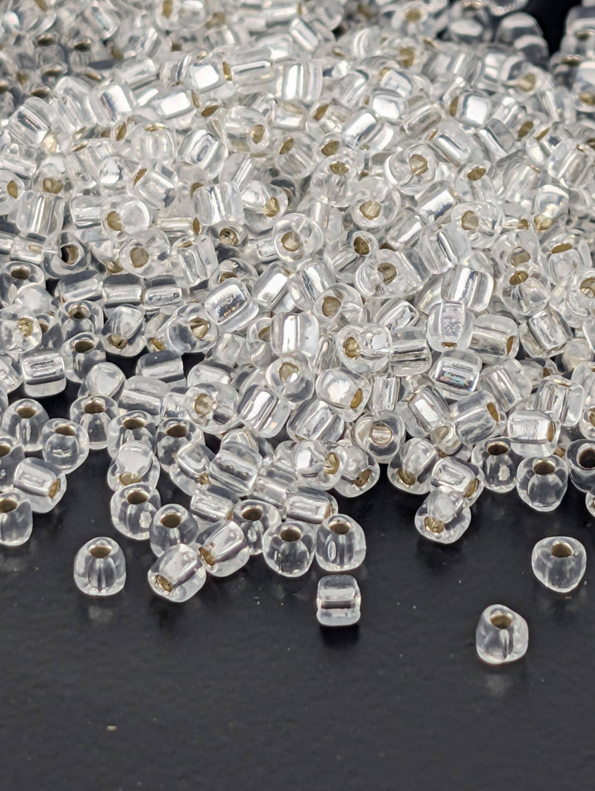 Crystal Translucent Silver Lined Miyuki Triangle Size 10/0 (15g