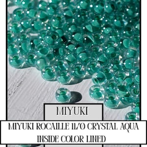 11-0219 Miyuki Rocailles 11/0 | Crystal/Aqua Inside Color Lined 20g